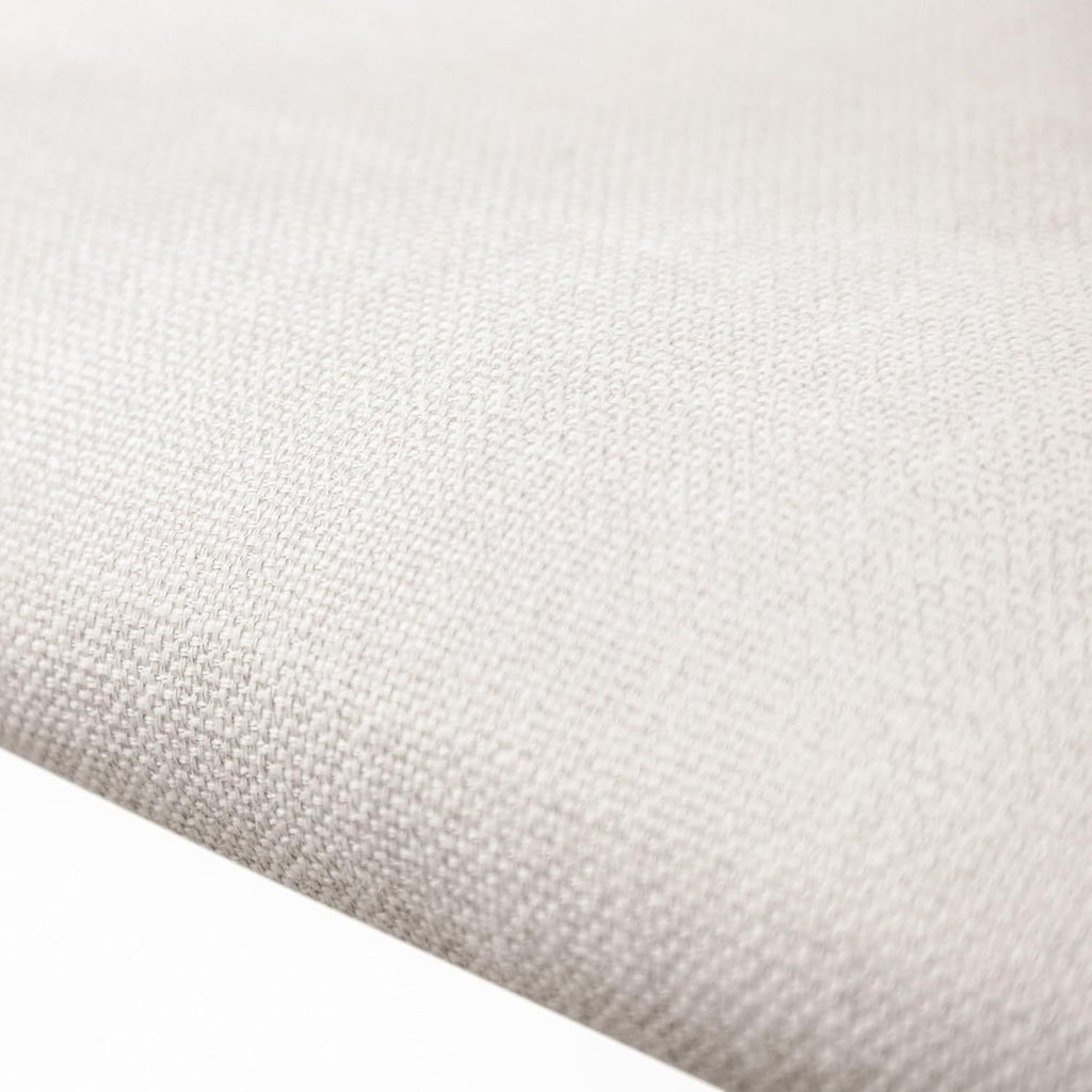 Close-up of the beige textured fabric used on the seat of the contemporary counter height chair.