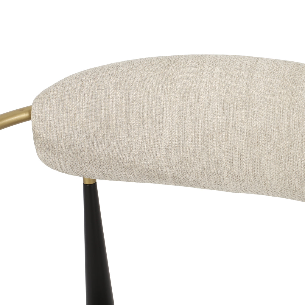 Detail of beige upholstered backrest on modern counter stool, emphasizing textured fabric and comfort.