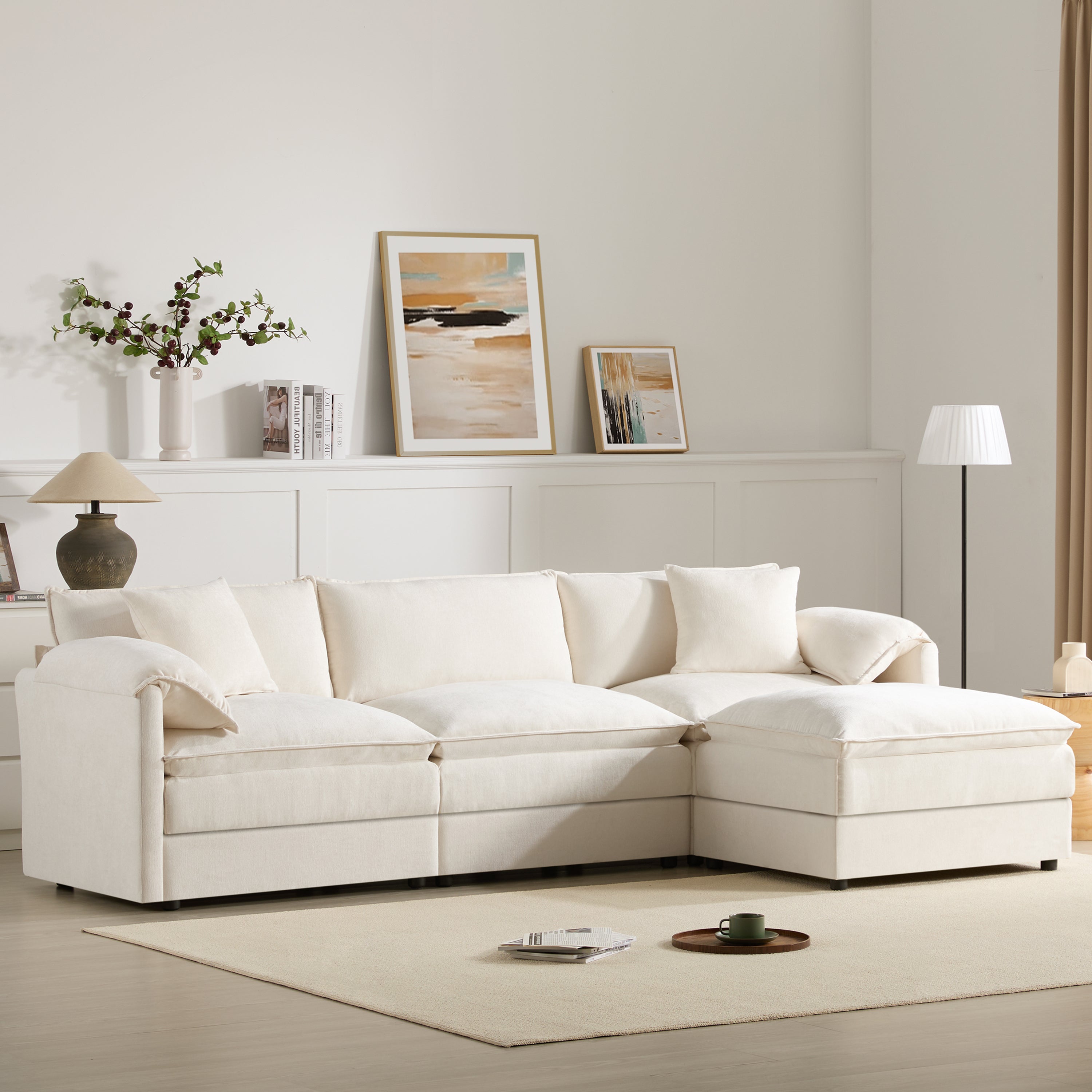 Cream Chenille Modular Sectional Sofa styled in a modern living room, showcasing deep seating and versatile ottoman placement.