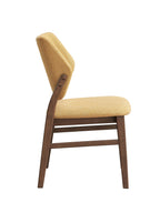 Side profile of Sarha Dining Set chair with yellow linen upholstery and angled backrest for ergonomic support.
