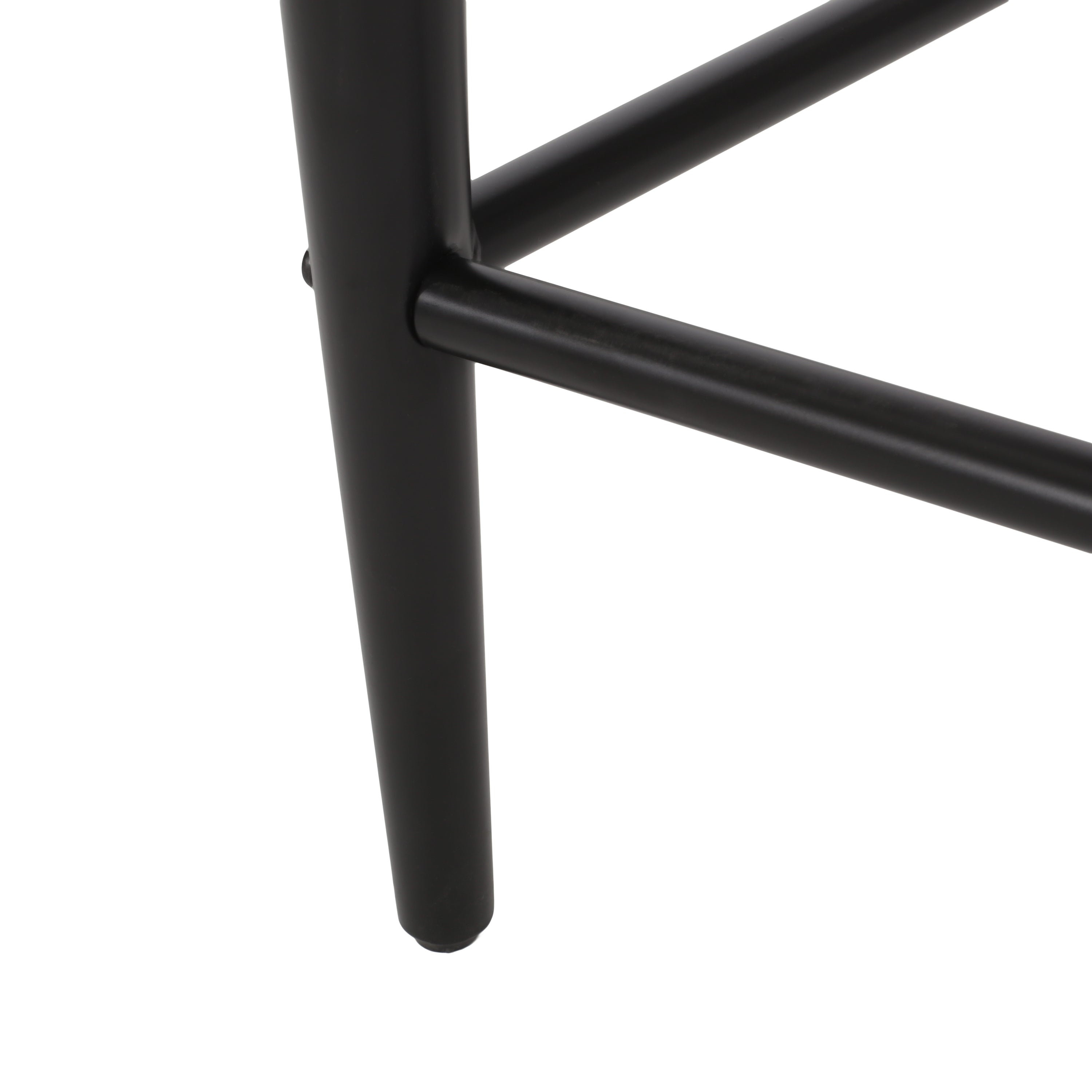 Close-up of black iron leg on modern counter stool, highlighting sturdy and sleek construction.