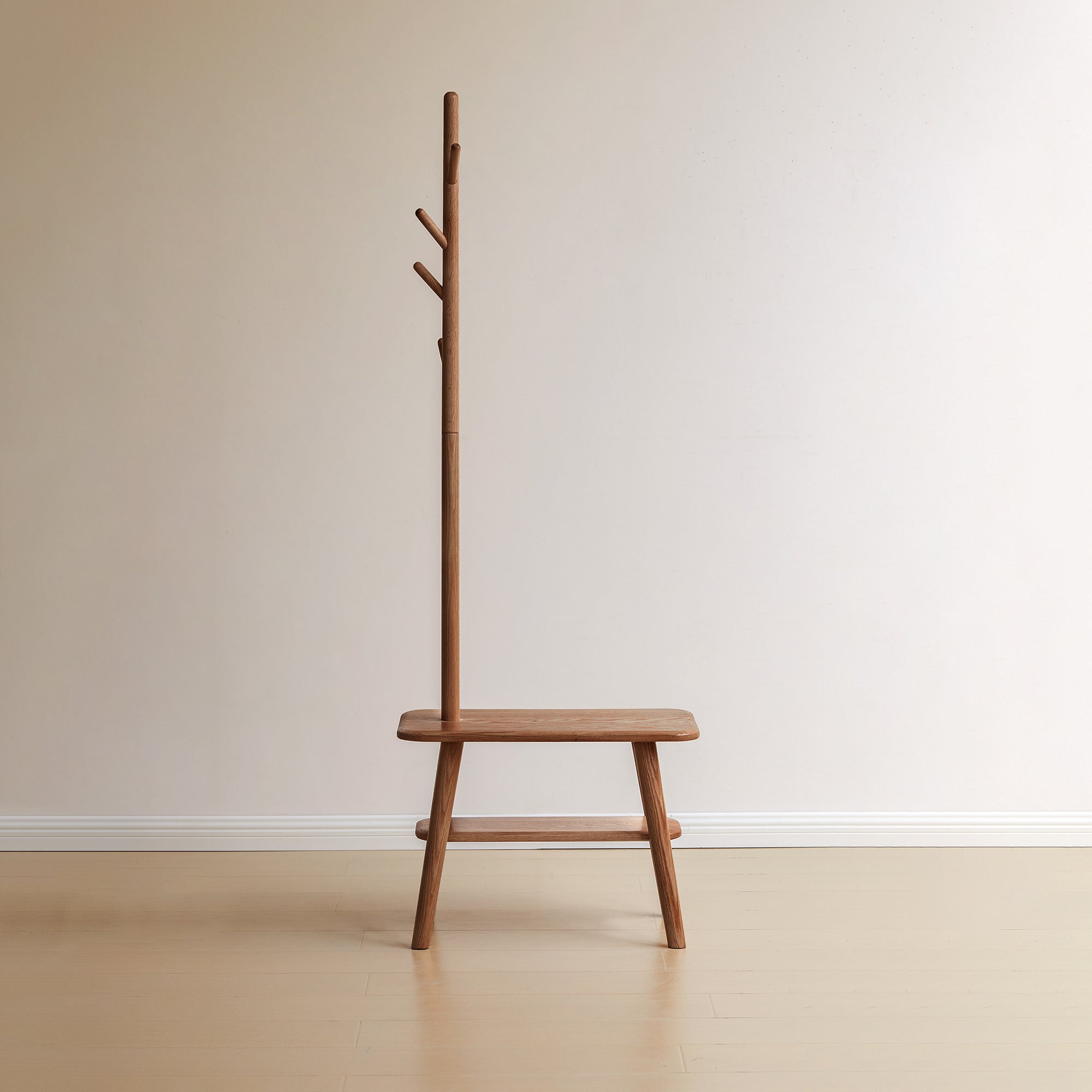 Solid Wood Shoe Stool with Coat Hanger in oak finish, featuring vertical coat hooks and a bench seat for entryway storage and seating.