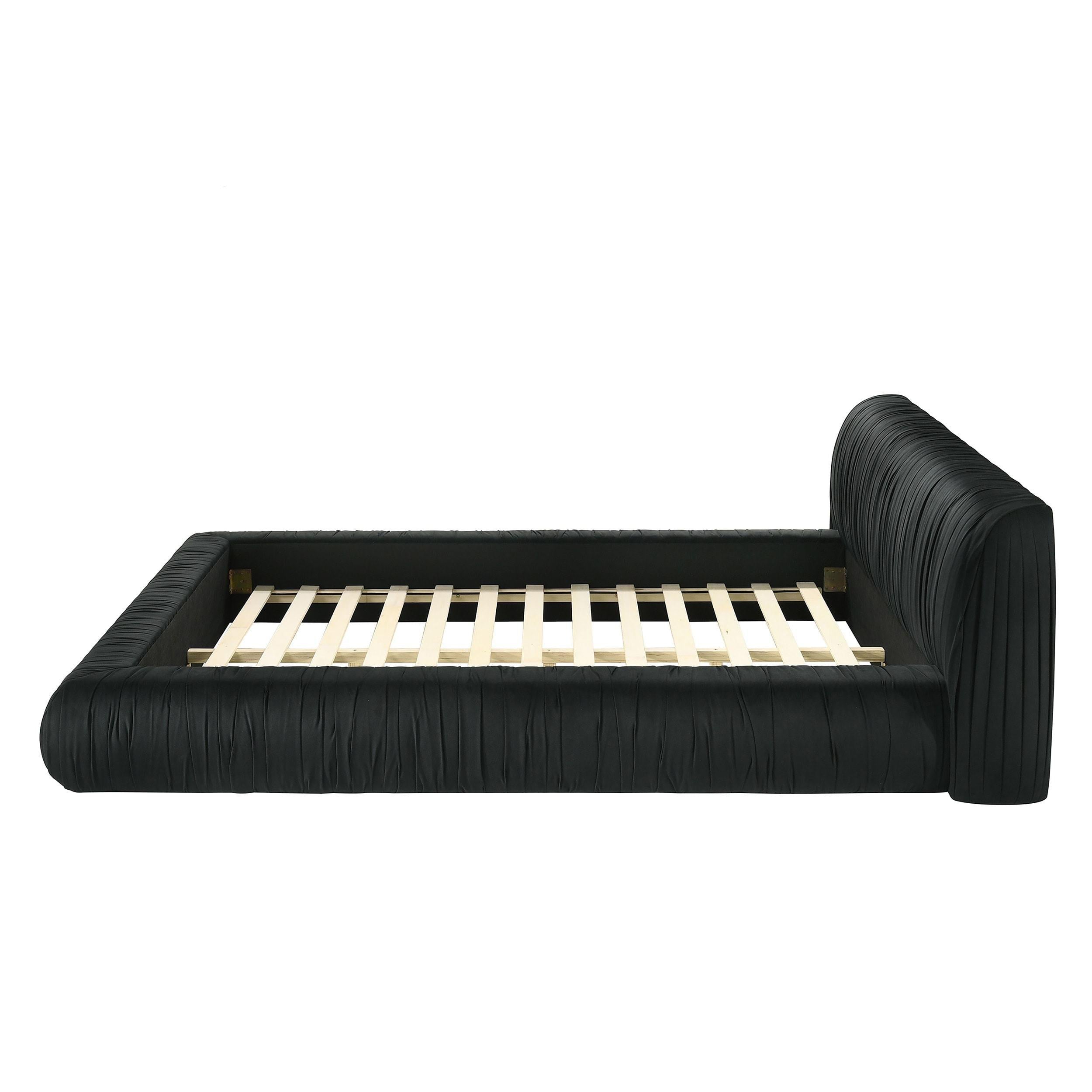 Black Upholstered King Size Bed with Pleated Design.