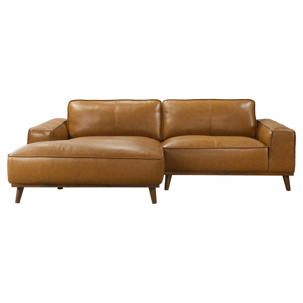 Mid-century modern tan leather sectional sofa with a left-facing chaise and tapered walnut wood legs.