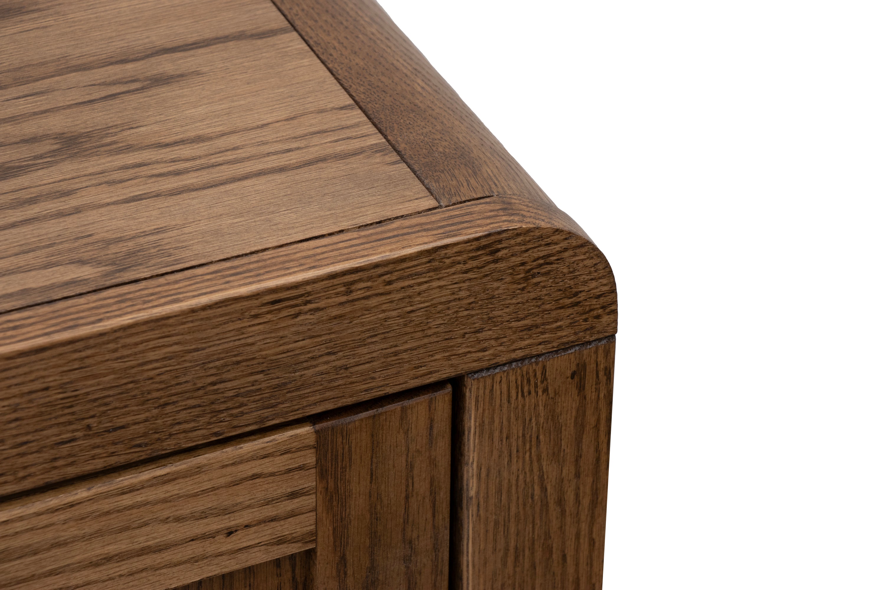 Close-up of rounded edge on Haven 15 inch Oak Chairside Table. Smooth oak finish highlights craftsmanship and durability.