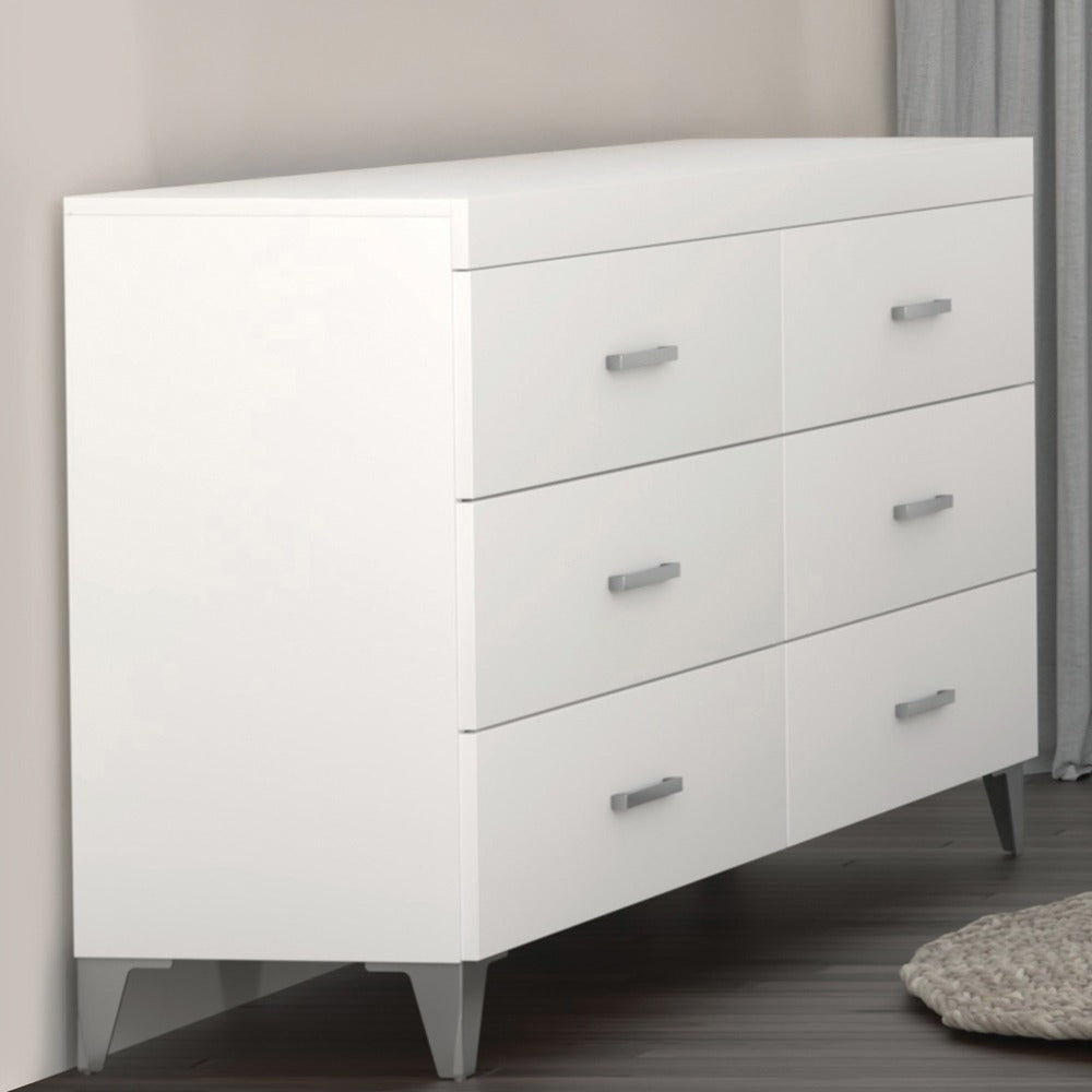 Side angle of contemporary white dresser with chrome legs and handles, fitting seamlessly into modern bedroom decor.