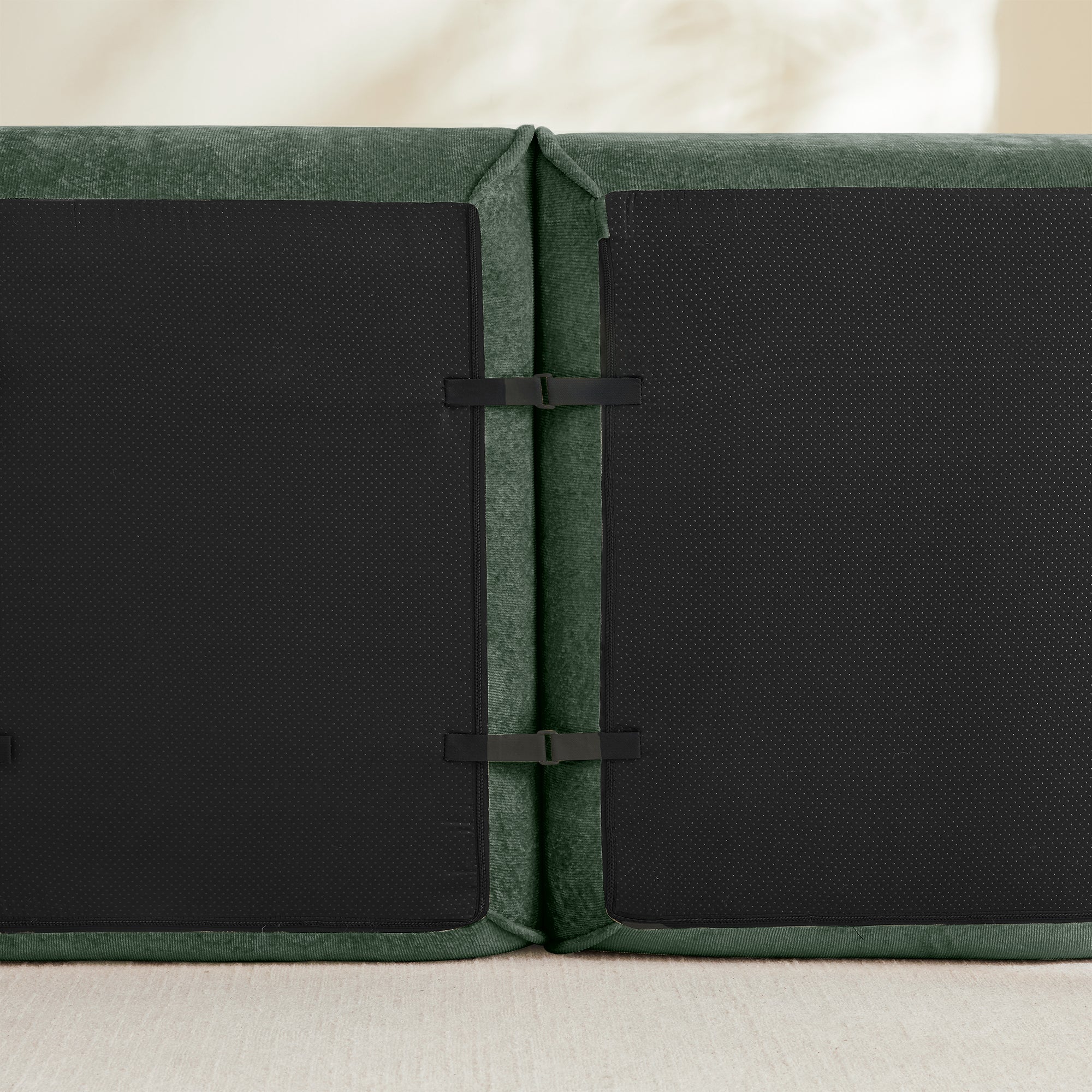 Close-up of the underside connectors on the 4 Seat Velvet Sofa - Modular Green Sofa showing secure attachment design for easy configuration.