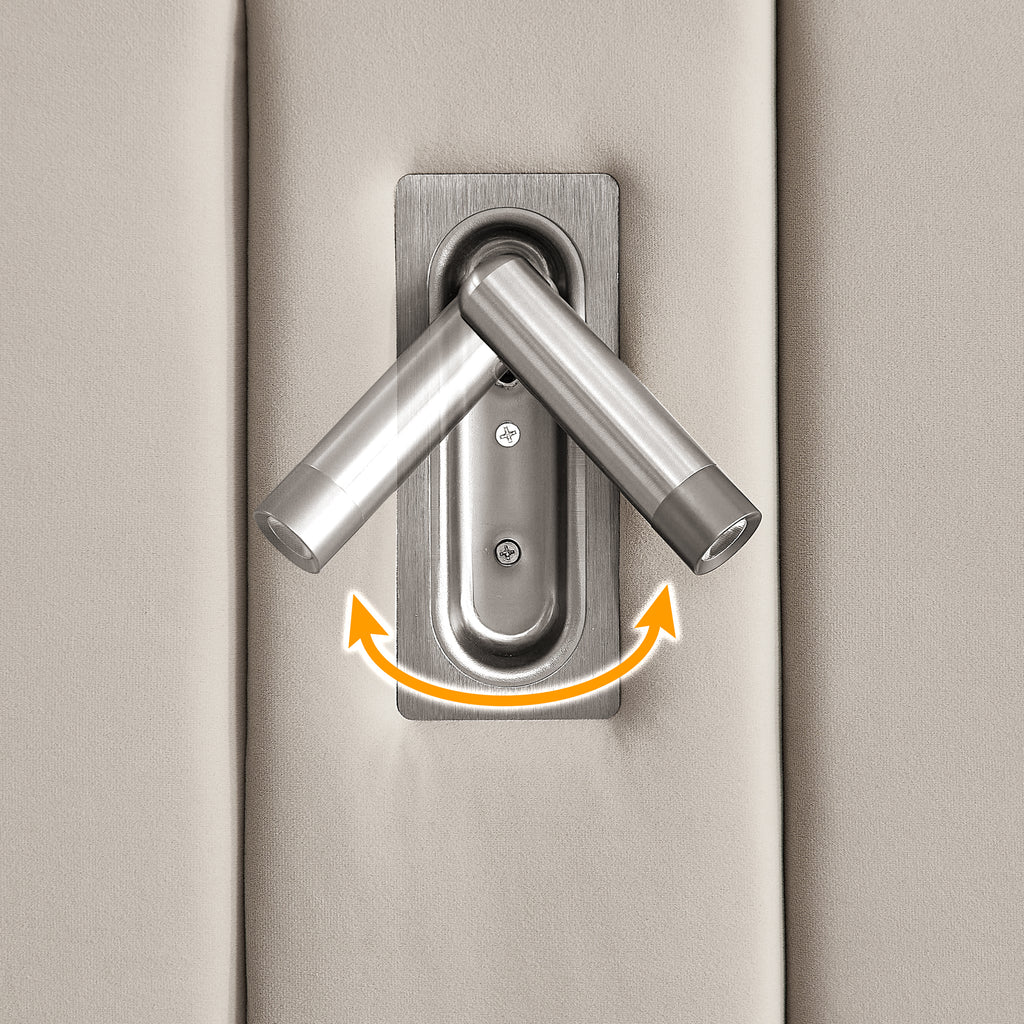 Close-up of adjustable wall-mounted reading lamp on velvet headboard of queen upholstered bed frame with modern design.