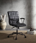 Barack Black Leather Chair - Office Seating with padded seat and backrest, swivel base, and aluminum frame in a modern workspace setting.