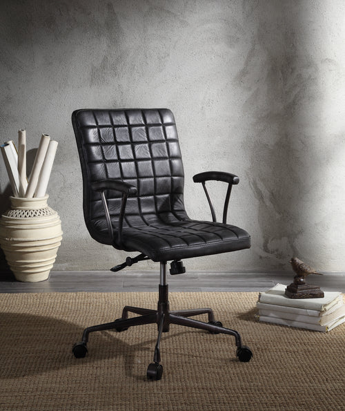 Barack Black Leather Chair - Office Seating with padded seat and backrest, swivel base, and aluminum frame in a modern workspace setting.