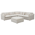 Modern ivory 6-piece modular sectional sofa with reversible plush cushions and a matching square ottoman.