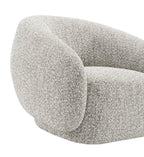 Brown Swivel Chair with Boucle Upholstery.