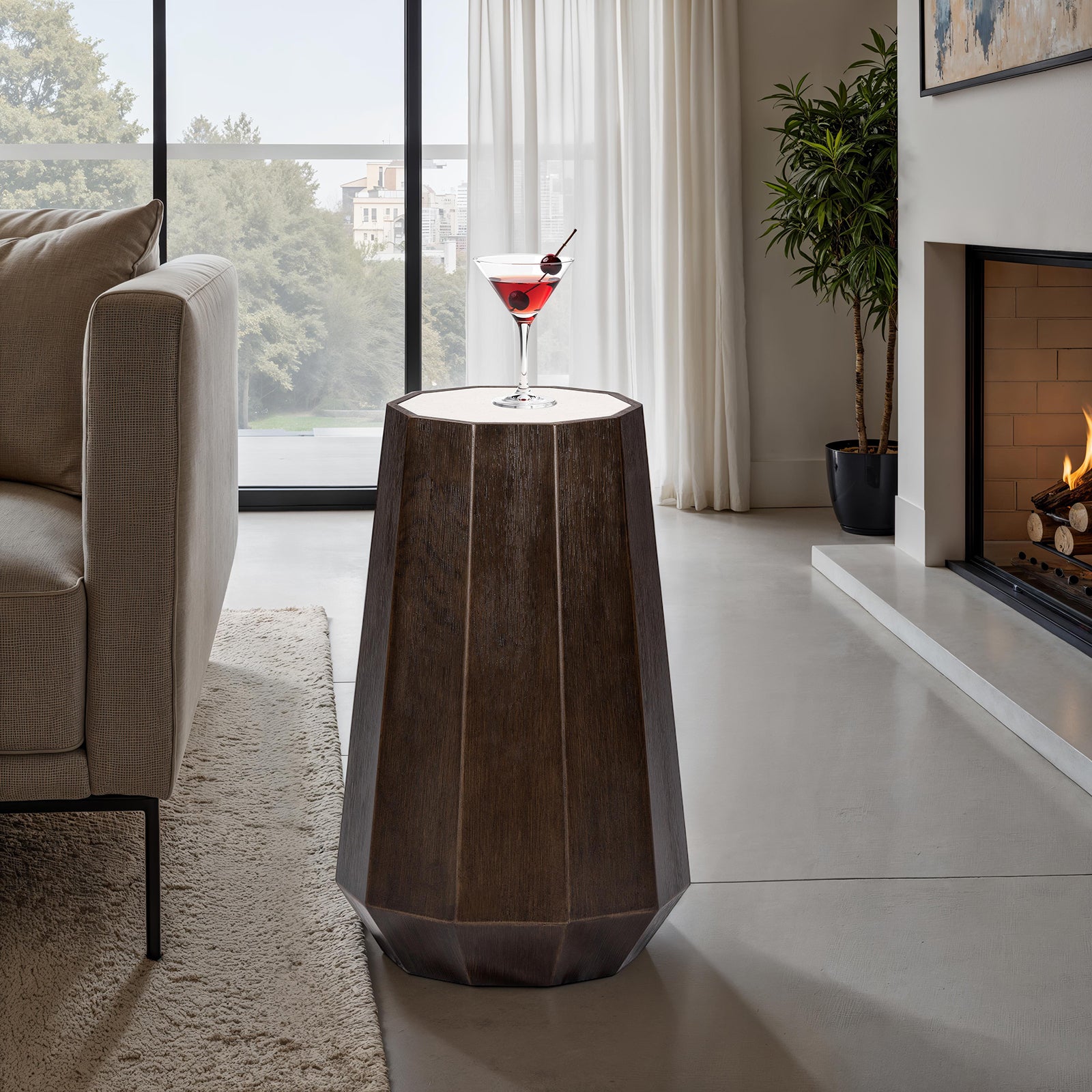 Elegant transitional martini table with stone top and wire-brushed walnut finish, styled in a bright living room with modern decor.