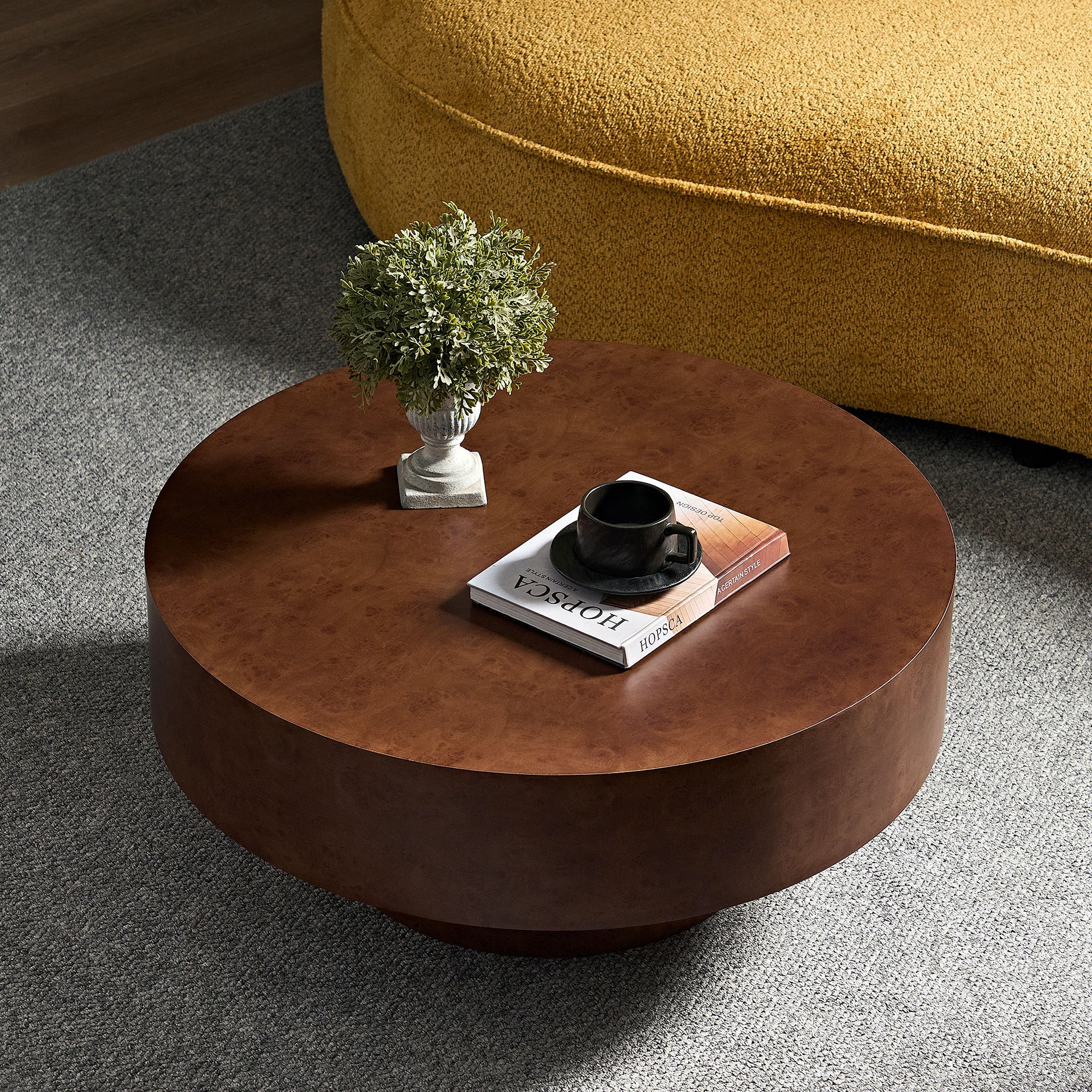Top view of Faux Burl Coffee Table showcasing its smooth walnut finish and compact round design for small spaces.