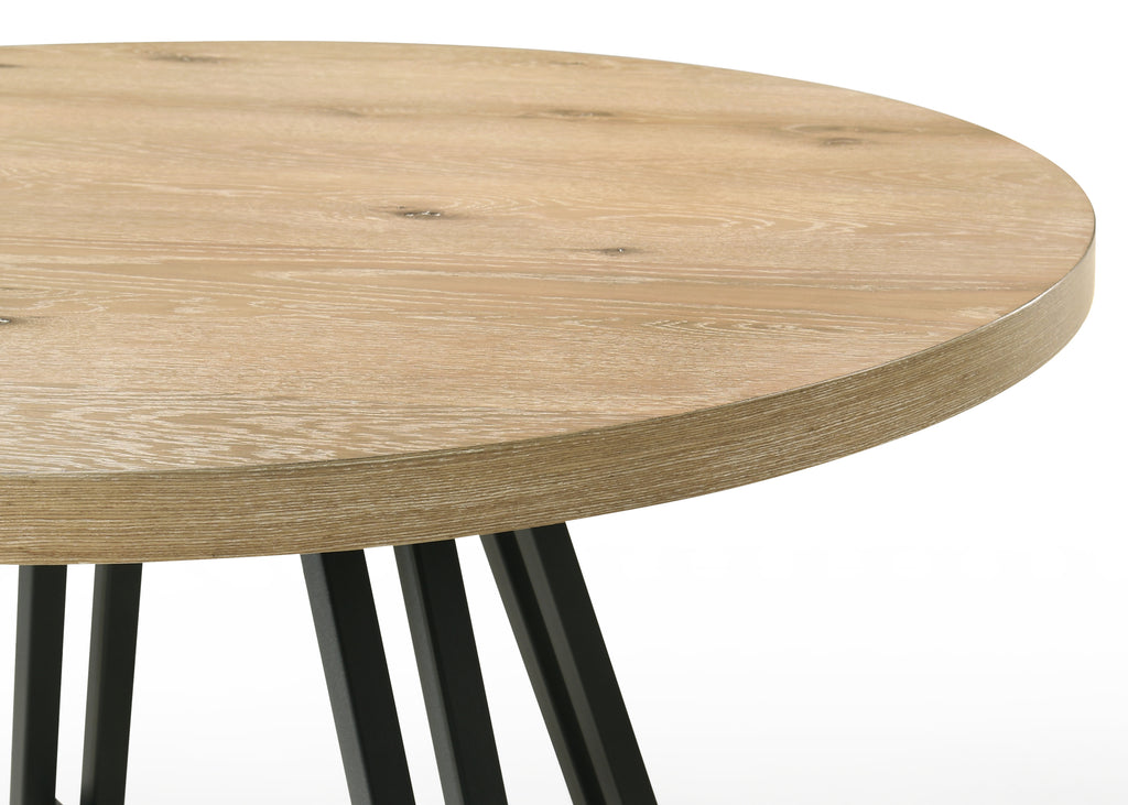 Close-up of the oak tabletop showcasing natural wood grain texture on the Round Oak Dining Table Set.