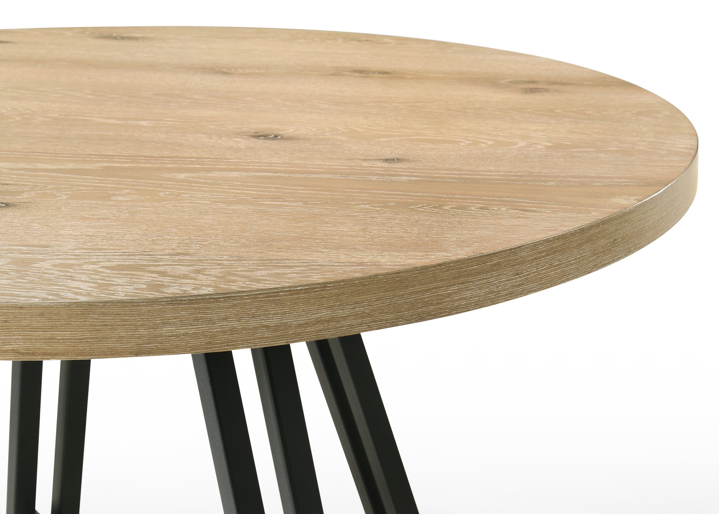 Close-up of the oak tabletop showcasing natural wood grain texture on the Round Oak Dining Table Set.