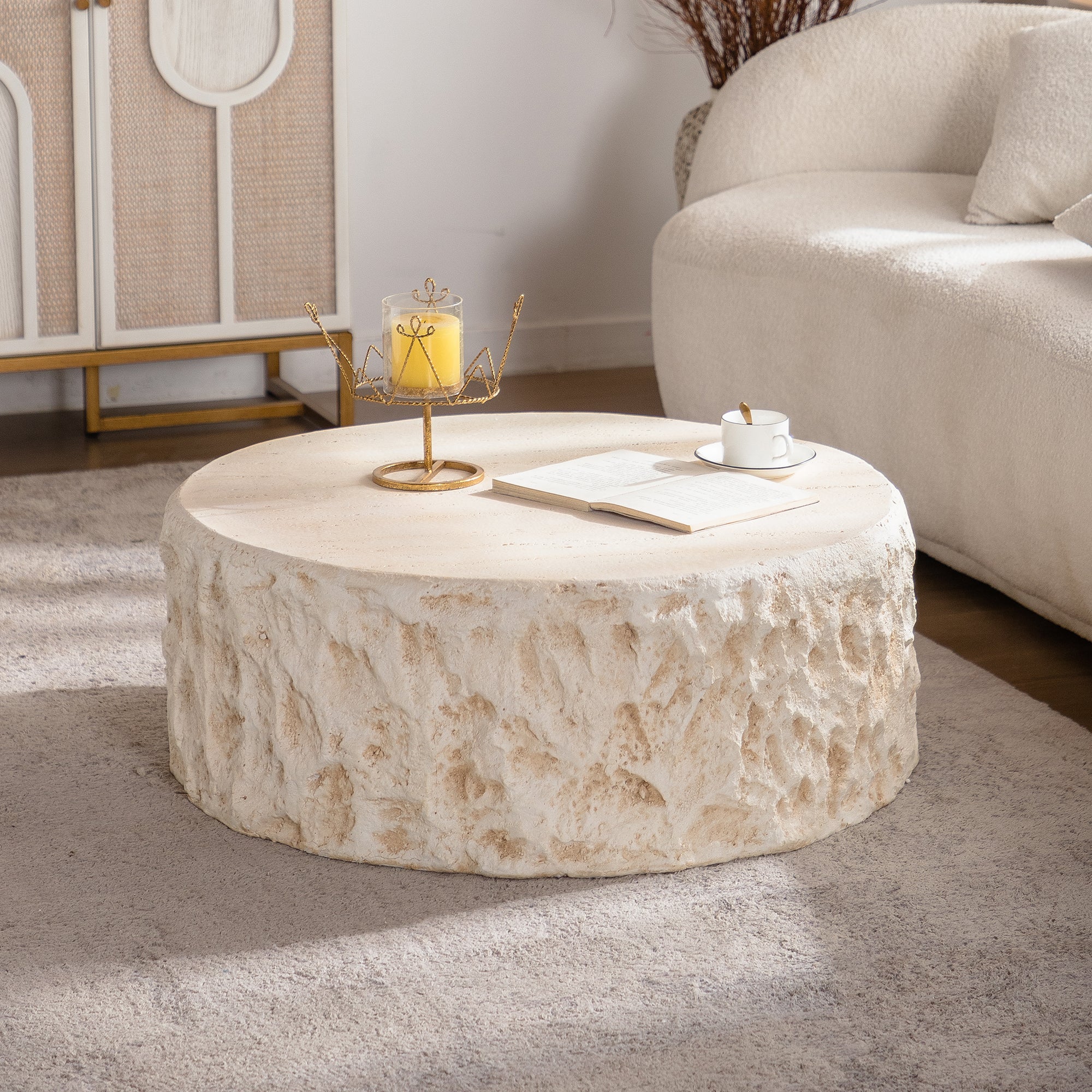 Mid-Century MgO Coffee Table in a modern living room, featuring a round faux stone design that adds elegance and warmth to the space.