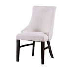 Elegant transitional dining arm chair with soft beige upholstery and dark wood legs, designed for comfort and style.