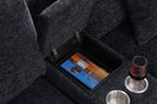 Hidden storage compartment in Celine sectional sofa with tablet and cupholders. Dark gray fabric with modern functionality.