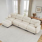 Beige 4-seater modular L-shaped sectional in pleated chenille fabric with curved arms, an ottoman, and two round pillows.