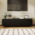 Modern black 58-inch TV console with a unique spiral wave texture, featuring a storage cabinet and two central drawers.