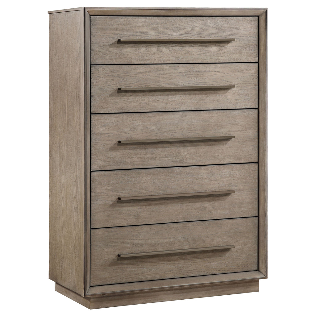 Taupe oak 5-drawer chest featuring mitered trim, recessed base, and minimalist metal pulls in a warm neutral finish.