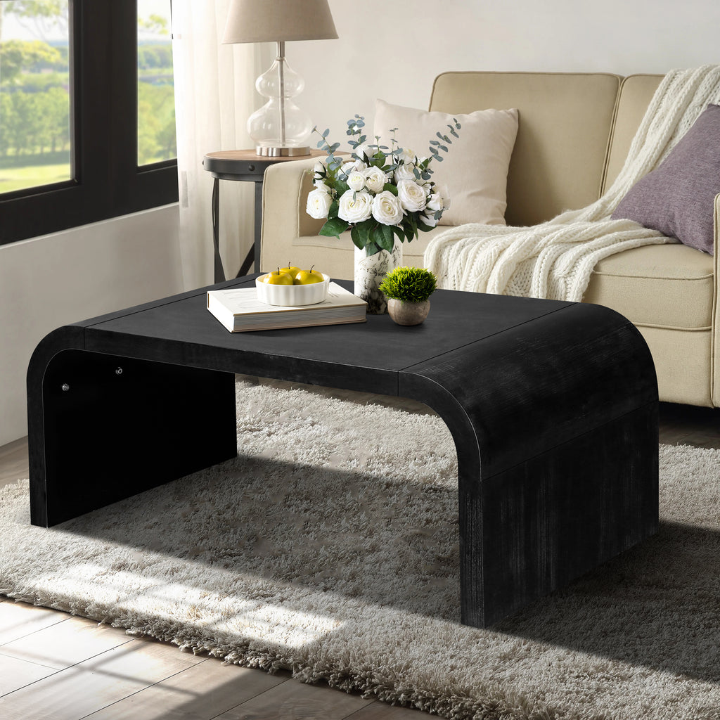 Farmhouse Crafts Coffee Table with vintage curved design in black finish, styled in a cozy living room with neutral decor and natural light.