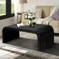 Farmhouse Crafts Coffee Table with vintage curved design in black finish, styled in a cozy living room with neutral decor and natural light.