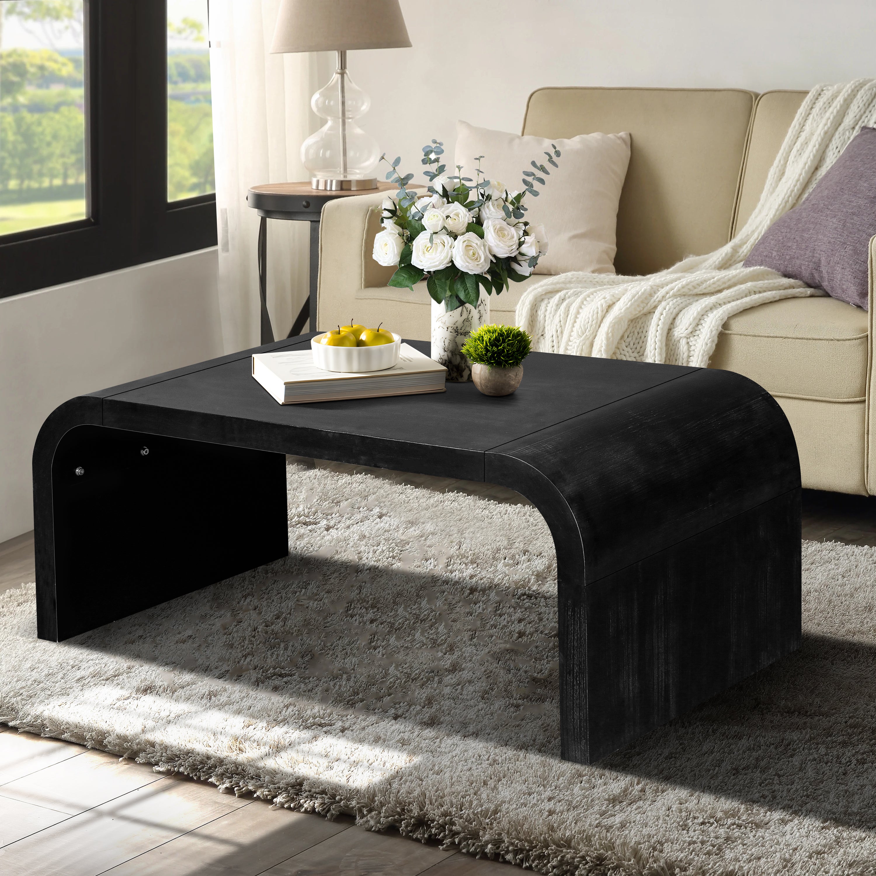 Farmhouse Crafts Coffee Table with vintage curved design in black finish, styled in a cozy living room with neutral decor and natural light.