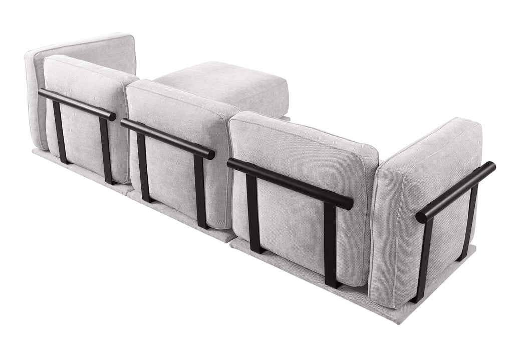Angled back view of modular sectional sofa with visible dark wood supports, showcasing modern design and modular configuration.