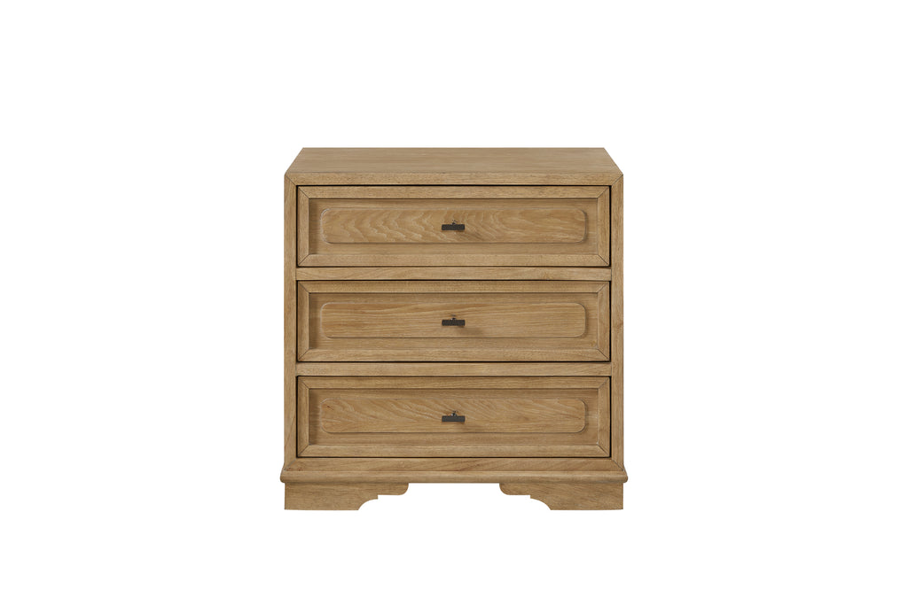 Three-drawer nightstand in a cashew oak wood finish with framed drawer fronts and dark minimalist hardware.
