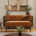 Burnt Orange Velvet Bench with tufted backrest in a mid-century modern living room, styled with neutral decor and wood accents.