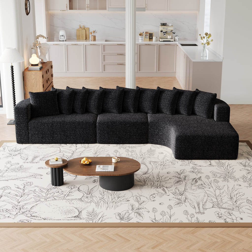 Chenille Sectional Sofa - Modular L-Shaped Sofa in black chenille fabric with 10 pillows, styled in a contemporary open-concept living space.