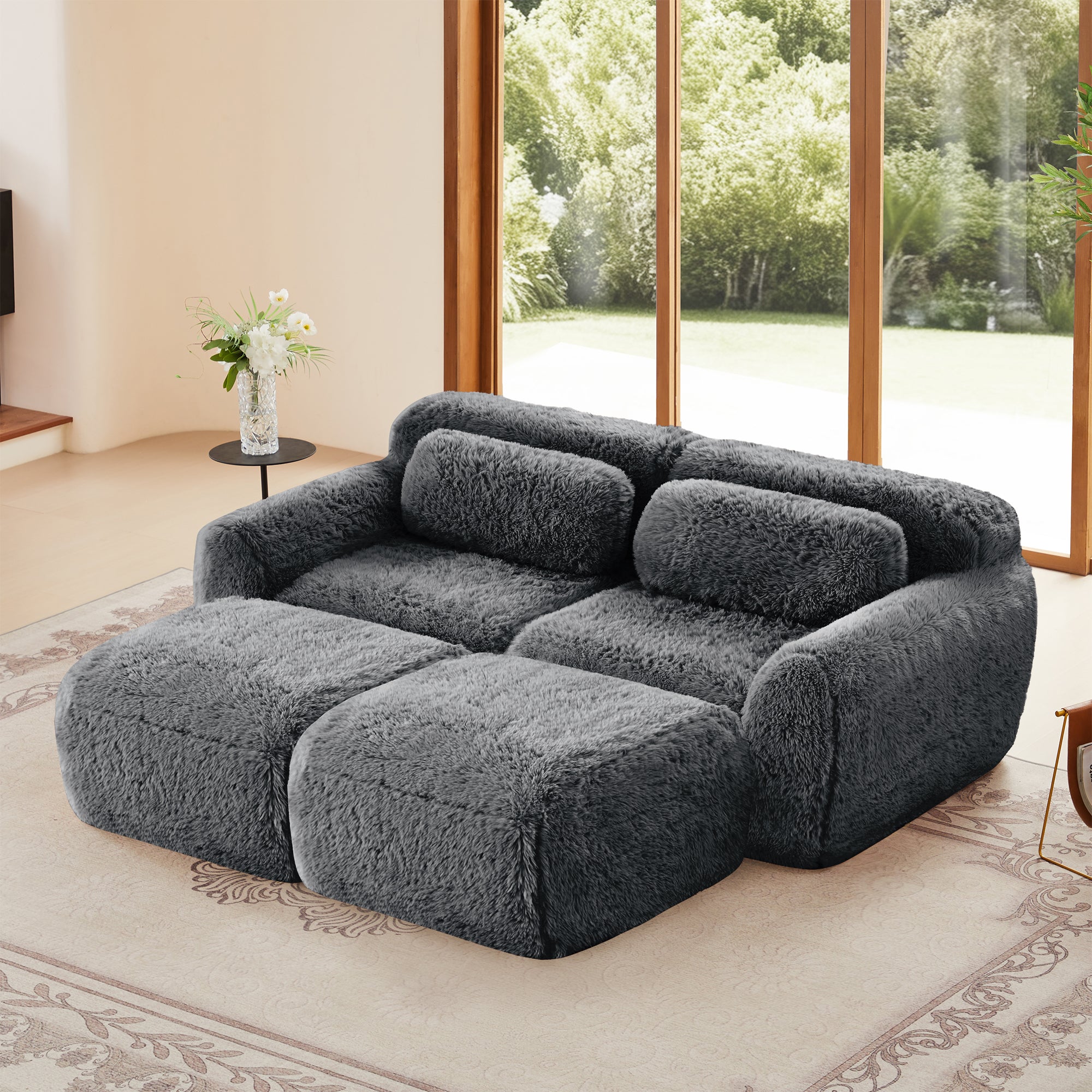 Plush Modular Sofa Dark Grey with ottoman and pillows in a sunlit living room, no assembly required and features ergonomic plush design.