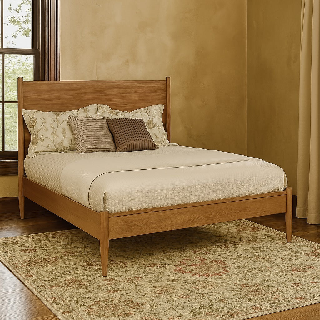 Full size Mid-Century Modern oak platform bed placed in a cozy bedroom with floral rug, showcasing its sleek wood frame and minimalist design.