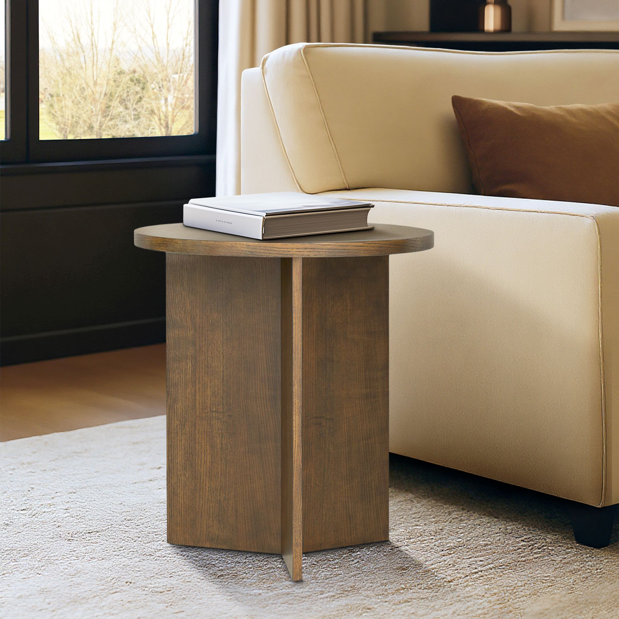 Sadie Walnut Brown Accent Table beside a cream sofa in a modern living room, ideal for small spaces and part of the Martha Stewart Perry Street collection.