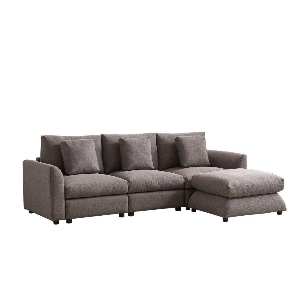 Angled view of modular sofa with ottoman in gray upholstery, designed for comfort and easy assembly in contemporary living spaces.