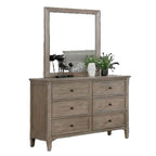 Transitional Gray Dresser with Round Pull Knobs.