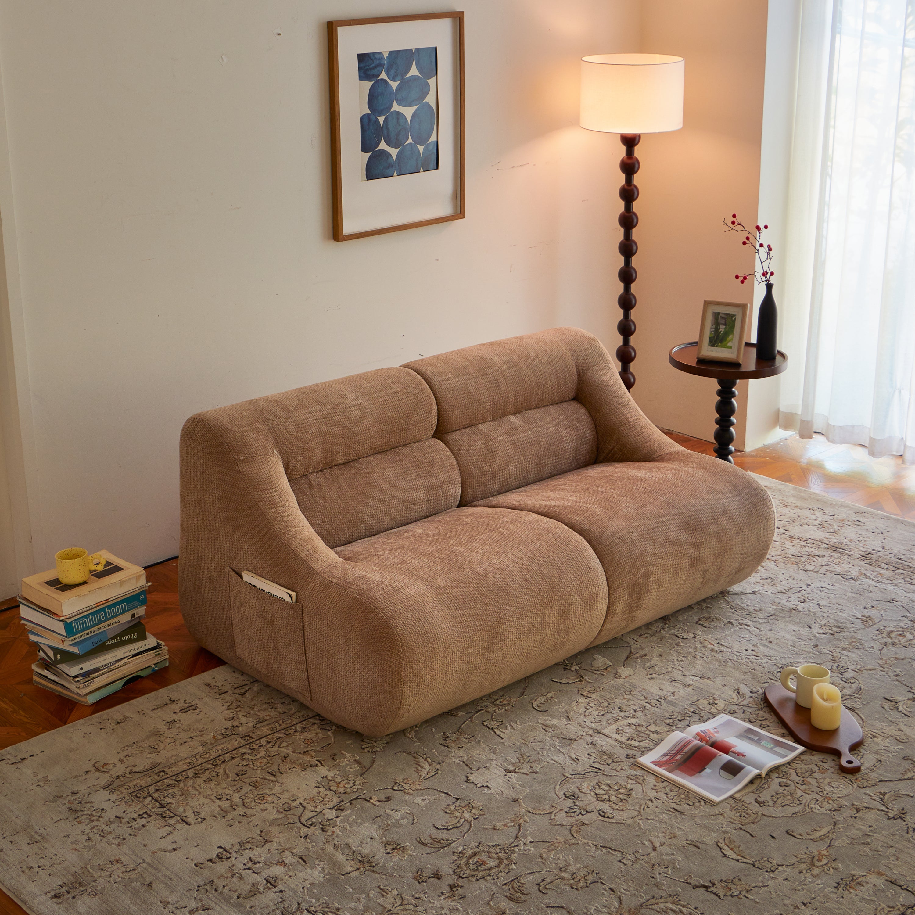 Angled view of brown Chenille Fabric 2-Seater Sofa with soft curves and deep seating, perfect for cozy interiors and easy relocation.