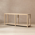 Minimalist console table in light natural cerused reclaimed pine with a long rectangular top and lower shelf.