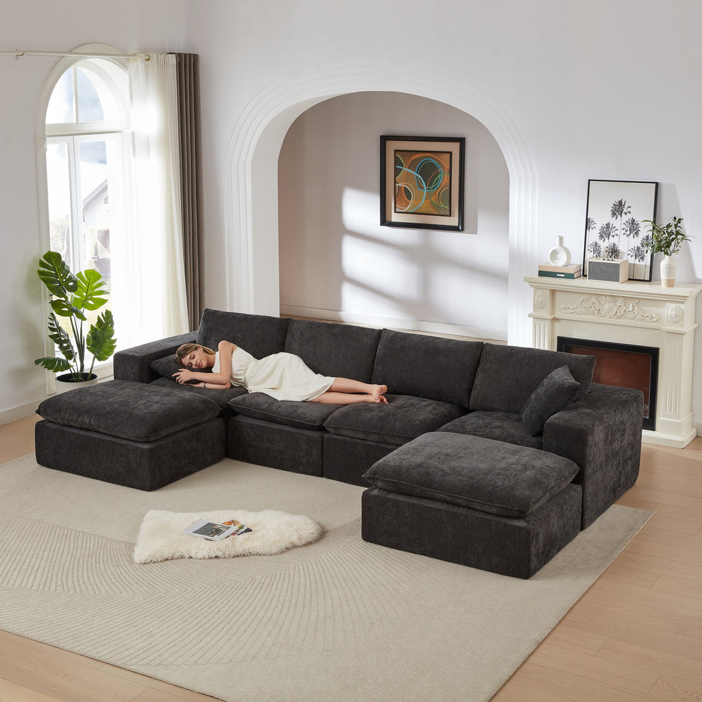 Chenille Cloud Sofa - Modern Comfort in dark gray with a woman resting, showcasing its soft, durable chenille fabric and spacious design.