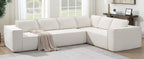 L-shaped modular sectional sofa in cream chenille fabric, styled in bright living room with throw blanket and modern decor.