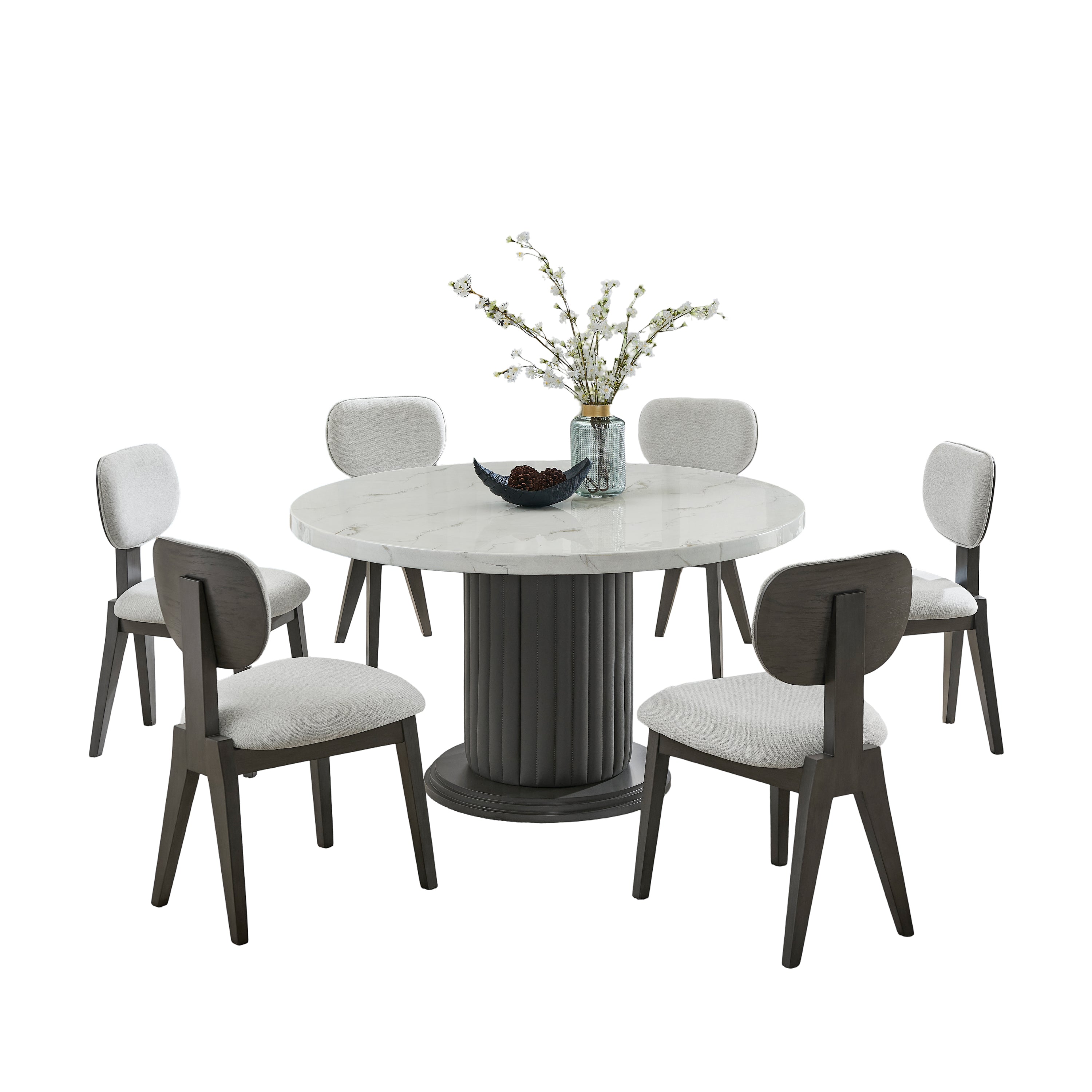 Valencia Dining Set - 7-Piece Marble featuring round faux marble table with gray pedestal base and 6 cushioned chairs in a white backdrop.