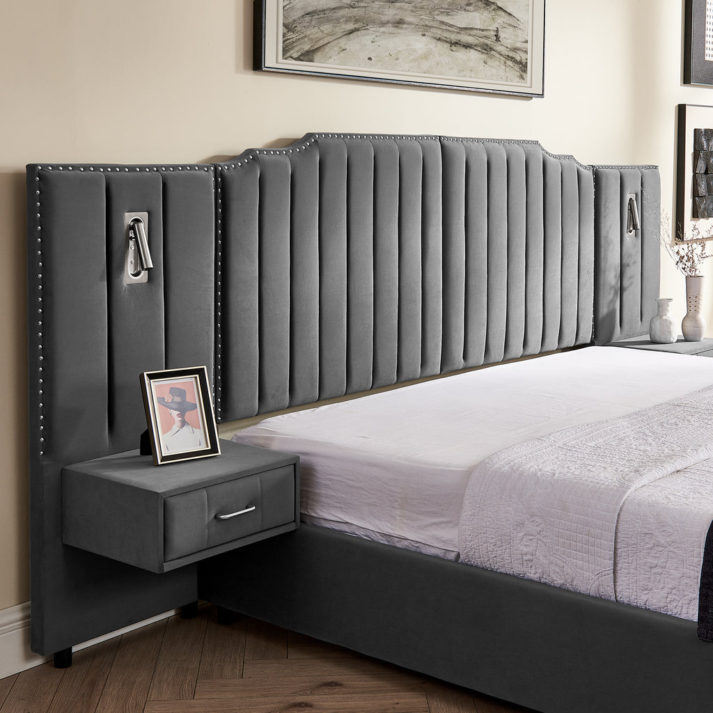 Close-up of velvet headboard with vertical tufting and attached nightstand, part of upholstered queen bed frame with lighting.