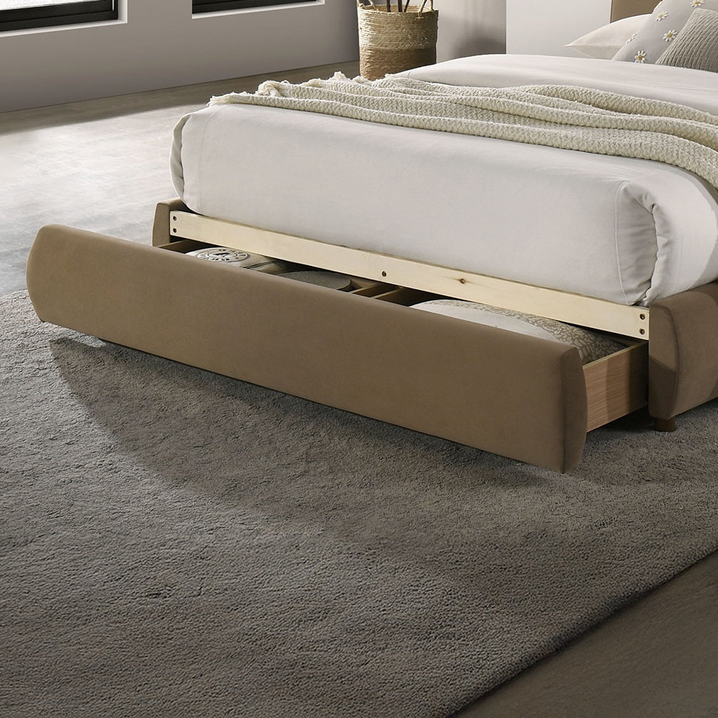 Detail of under-bed storage drawer in queen bed frame with curved headboard. Upholstered wood design offers hidden storage functionality.
