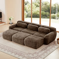 Chocolate modular sofa 3-seater plush fabric with movable ottoman in modern living room, no-leg design for easy cleaning.