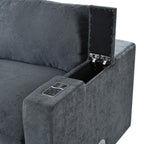 Close-up of modular sofa armrest with hidden storage compartment and control panel for USB, wireless charging, and Bluetooth speaker.
