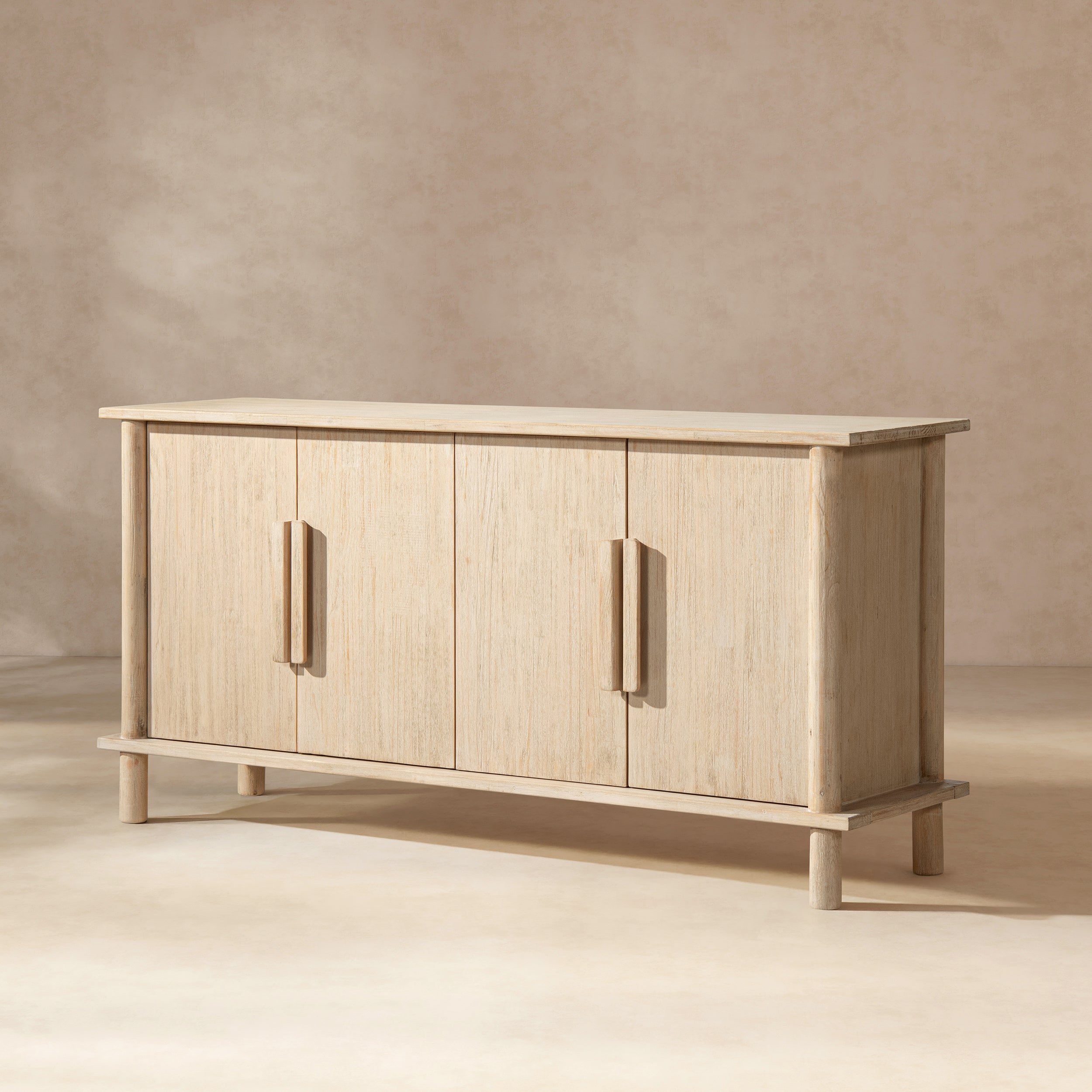 71-inch sideboard in light natural cerused reclaimed pine with four doors and minimalist vertical wood pulls.