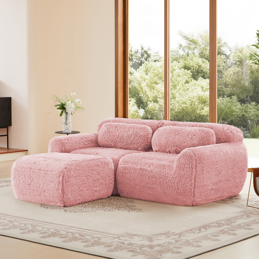 Ergonomic pink modular sofa with chaise lounge in plush fabric. Features soft cushions and anti-slip base, ideal for cozy living spaces.