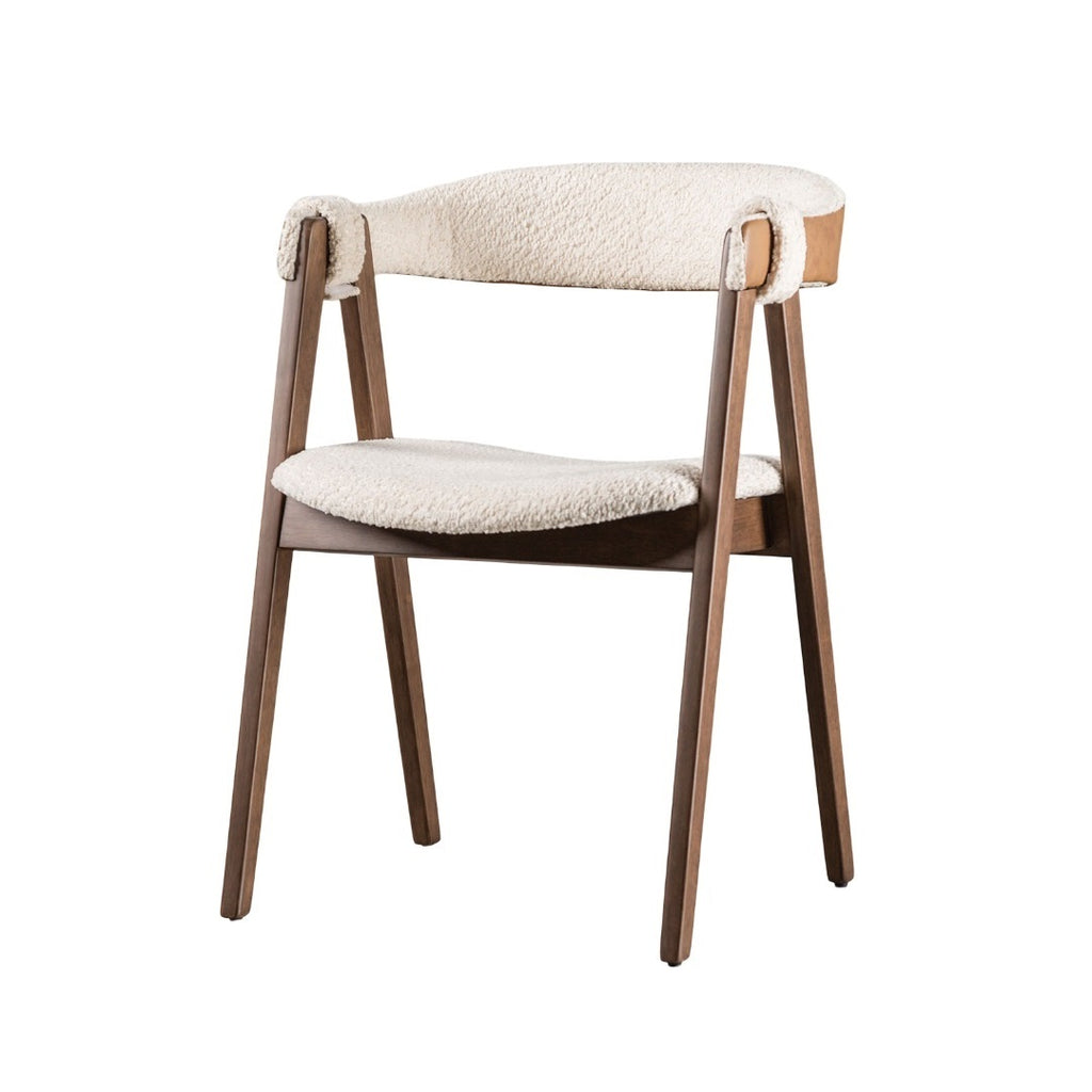Beige boucle upholstered Mid-Century Modern Side Chair with walnut wood frame and ergonomic curved backrest for dining spaces.
